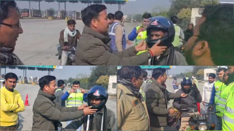 हाफिजपुर पुलिस की अनूठी पहल: बिना हेलमेट चल रहे जरूरतमंदों को बांटे मुफ्त हेलमेट